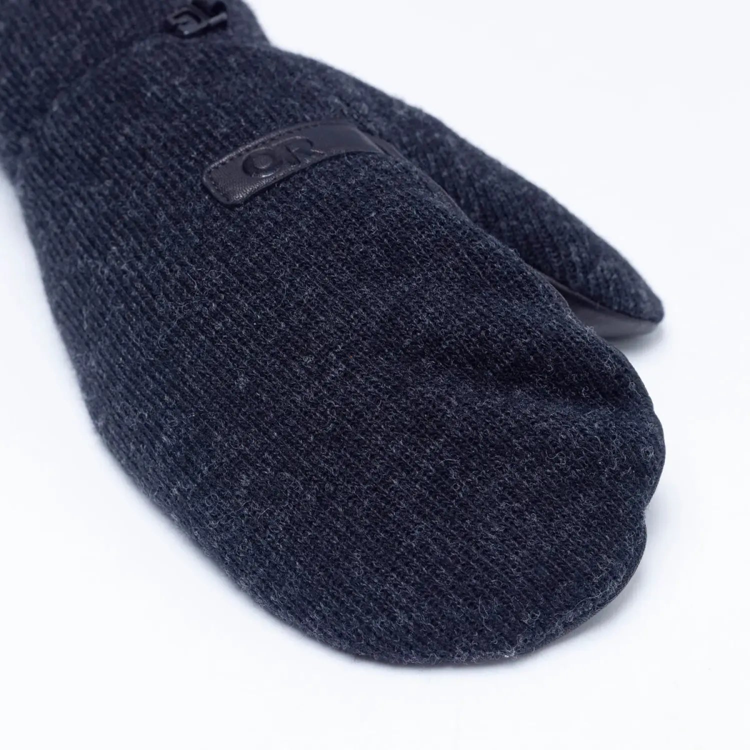 Outdoor Research Flurry Solstice Mitts shown in the Black color option. Top view.