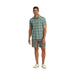 Outdoor Research Men's Astroman Short Sleeve Sun Shirt shown in the Balsam Plaid color option. Front view full length.