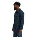 Outdoor Research Men's Feedback Shirt Jacket shown in Harbor Plaid. Side view on model