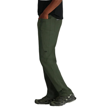 Outdoor Research Men's Ferrosi Pants shown in the Verde color option. Side view on model.