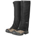 Outdoor Research Men's Rocky Mountain High Gaiters shown in black, and attached to brown boots (not included in sale), with grey embroidered OR logo.  