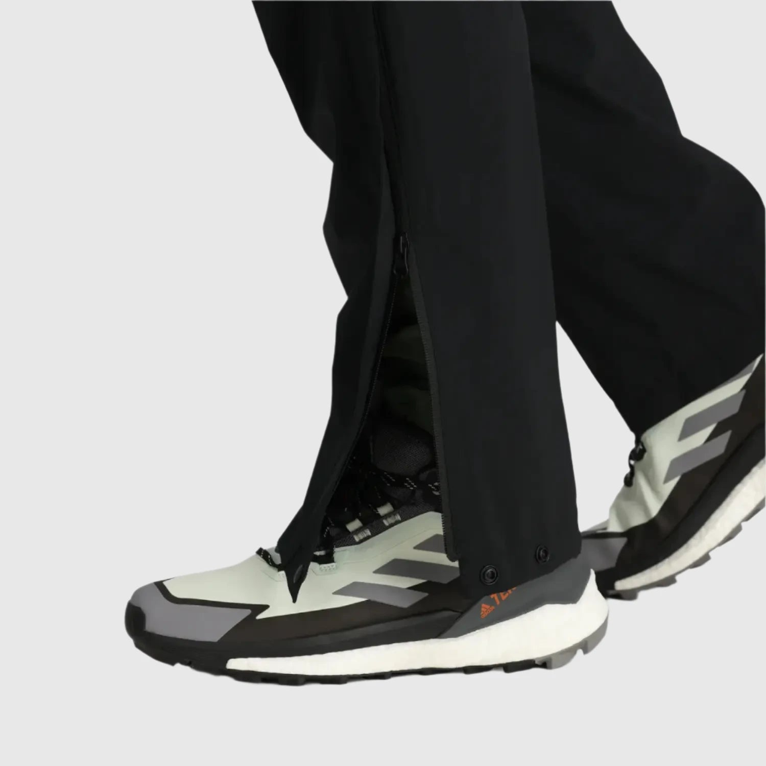 Outdoor Research Men's Stratoburst Stretch Rain Pants shown in the Black color option. Ankle view.