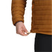 outdoor research mens transcendent down hoodie in bronze/cenote waist cinch model view