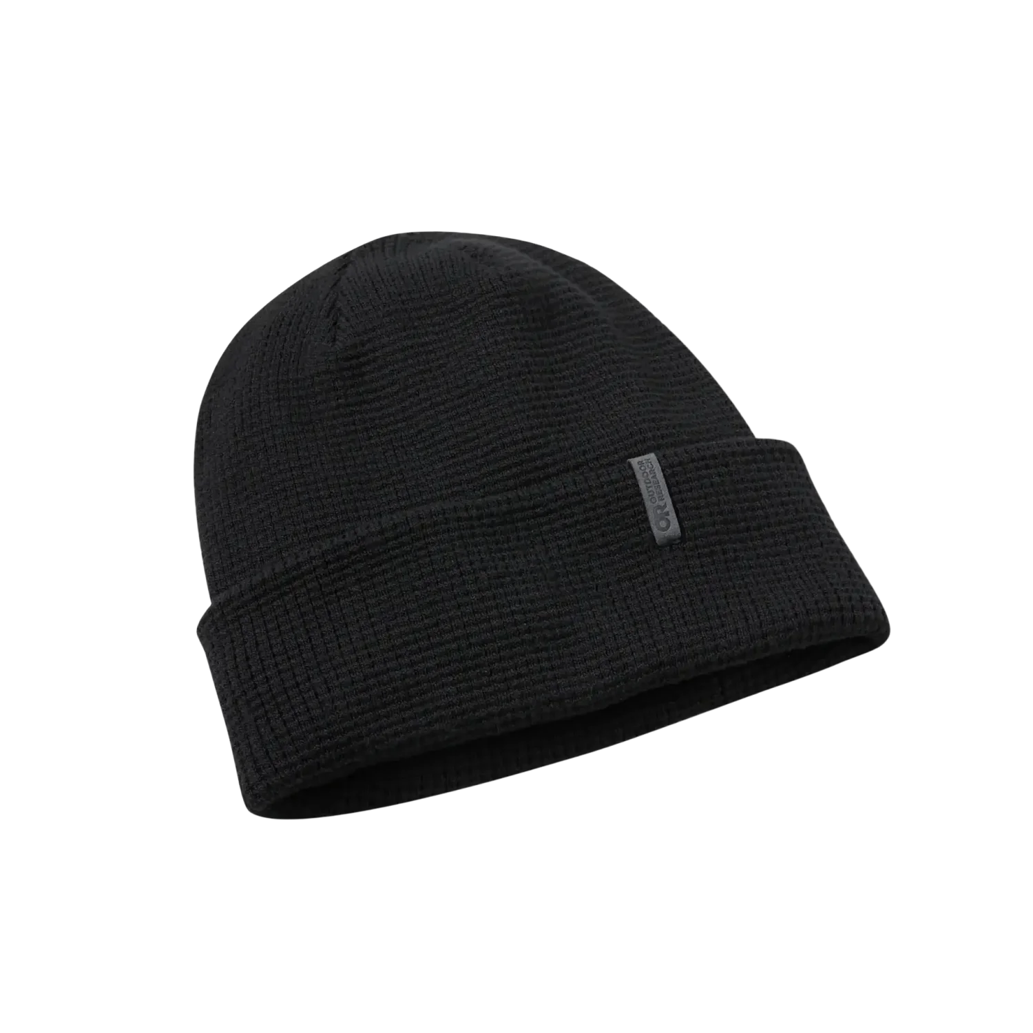 Black beanie hat on a light gray background