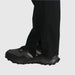 Outdoor Research Women's Stratoburst Stretch Rain Pants shown in the Black color option. Ankle view.