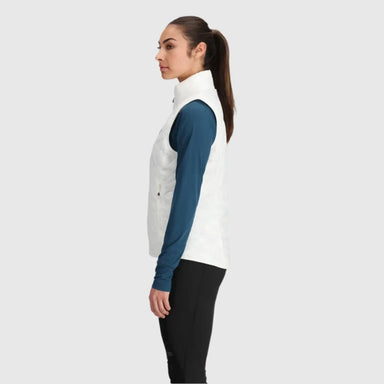 Outdoor Research Women's SuperStrand LT Vest shown in the Snow color option. Side view on model.