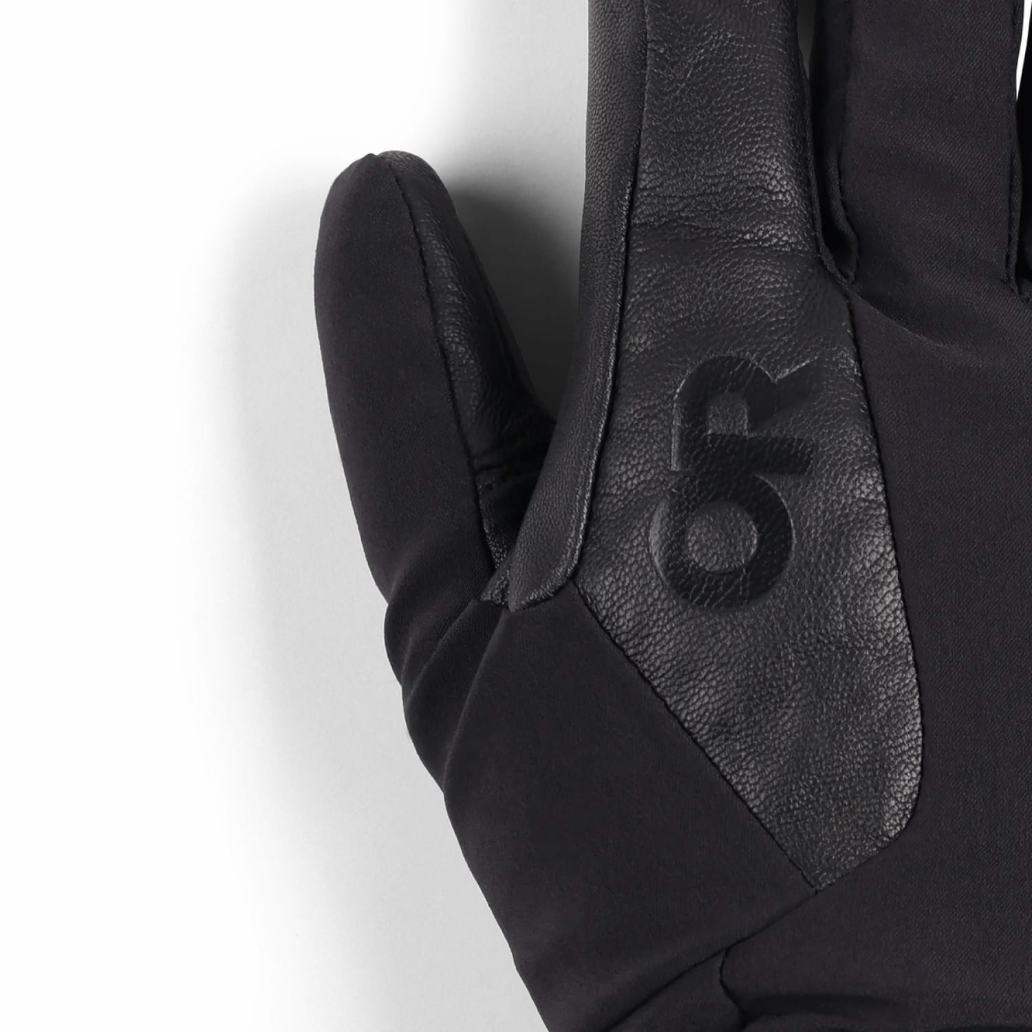 Outdoor Research Women's Sureshot Pro Gloves shown in the black color option. Thumb view.