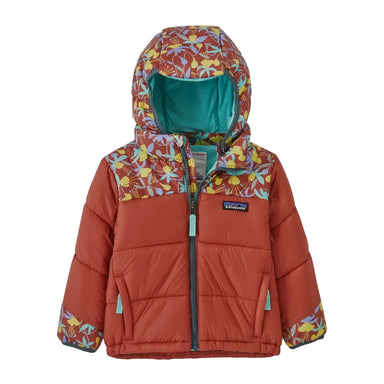 Patagonia Baby Astropuff Hoody shown in the Burl Red color option. Red chest and arms with a floral design on the shoulders, hood and cuffs. 