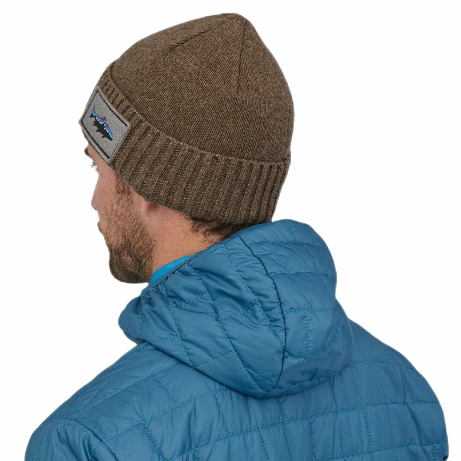 Patagonia Brodeo Beanie, Fitz Roy Trout Ash Tan, back view on model 