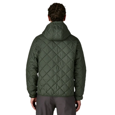 Patagonia Men's Diamond Quilted Bomber Insulated Hoody shown in the Old Growth Green color, back view on model.