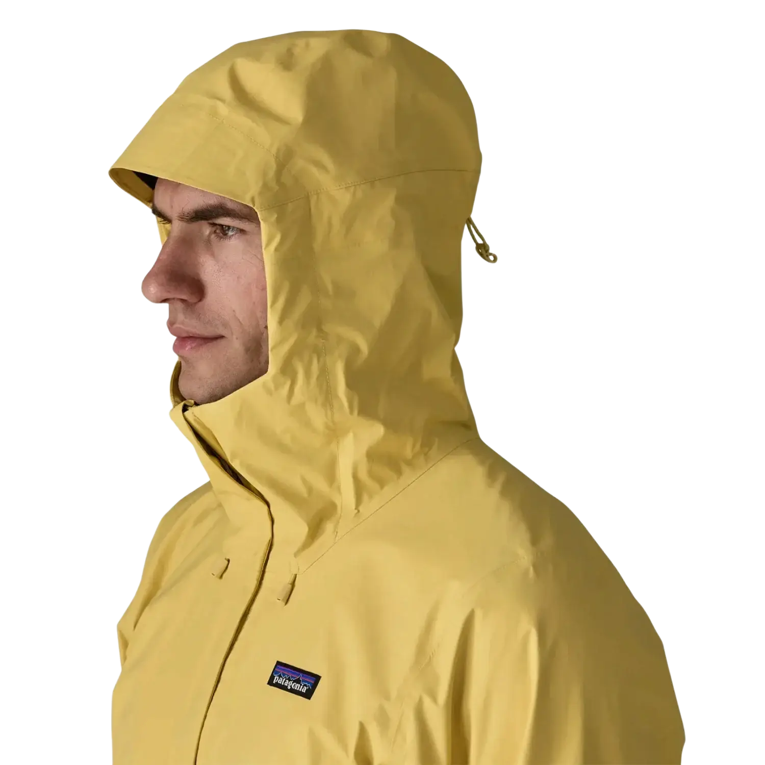 Patagonia Men's Torrentshell 3L Jacket in limestone yellow, on model hood up detail view