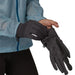 Patagonia R1® Daily Gloves, Ink Black, view of model putting gloves on 