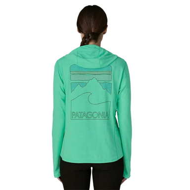 Patagonia Women's Capilene® Cool Sun Hoody - Peak Visions in Aqua Stone Teal X Dye, back view on model 