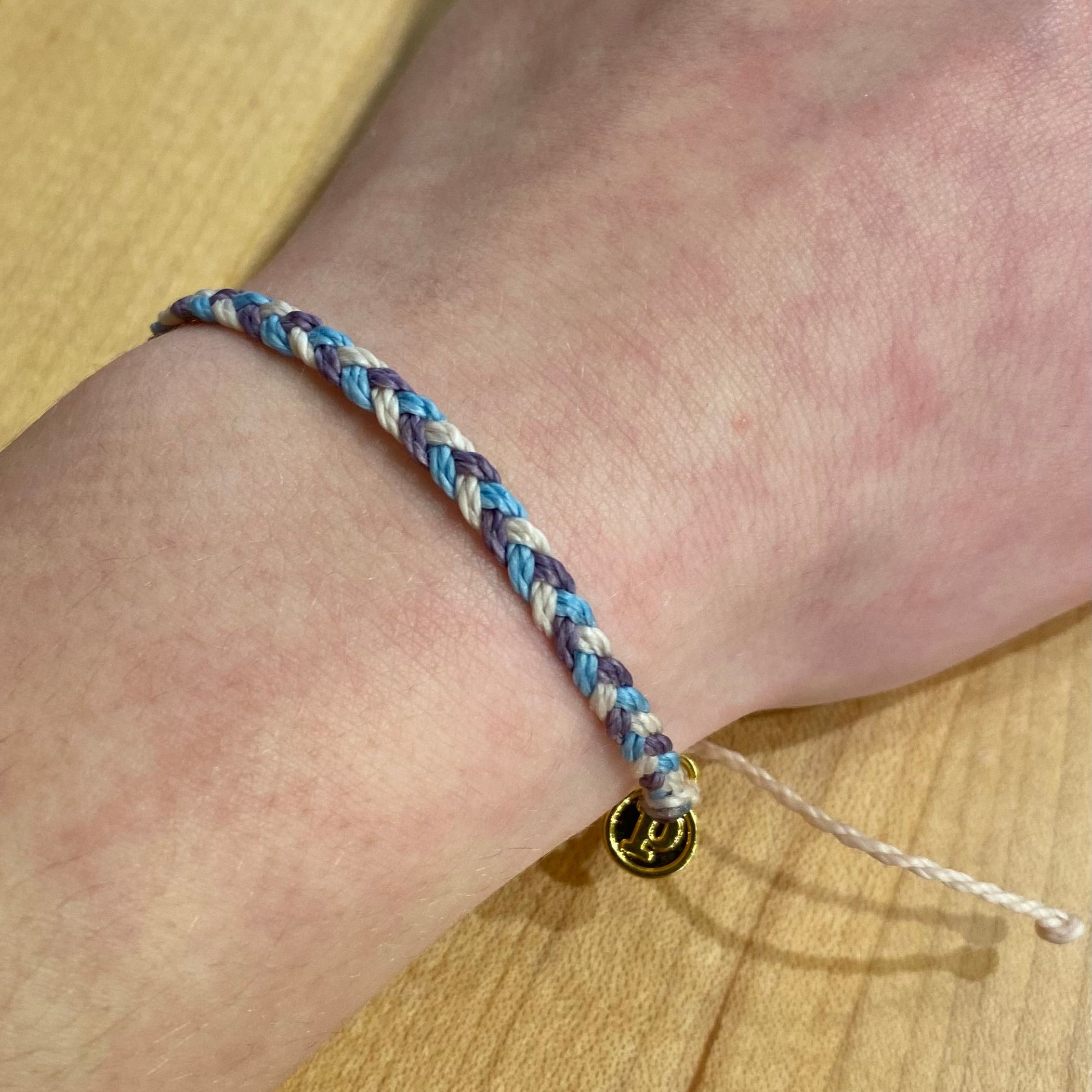 Pura Vida Mini Braided Bracelet in Pinky Promise, view on model