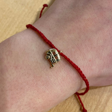 Pura Vida On The Road Bracelet in Dark Red Gold, view on model 