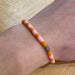 Pura Vida Seascape Bracelet in Golden Poppy, view on model 