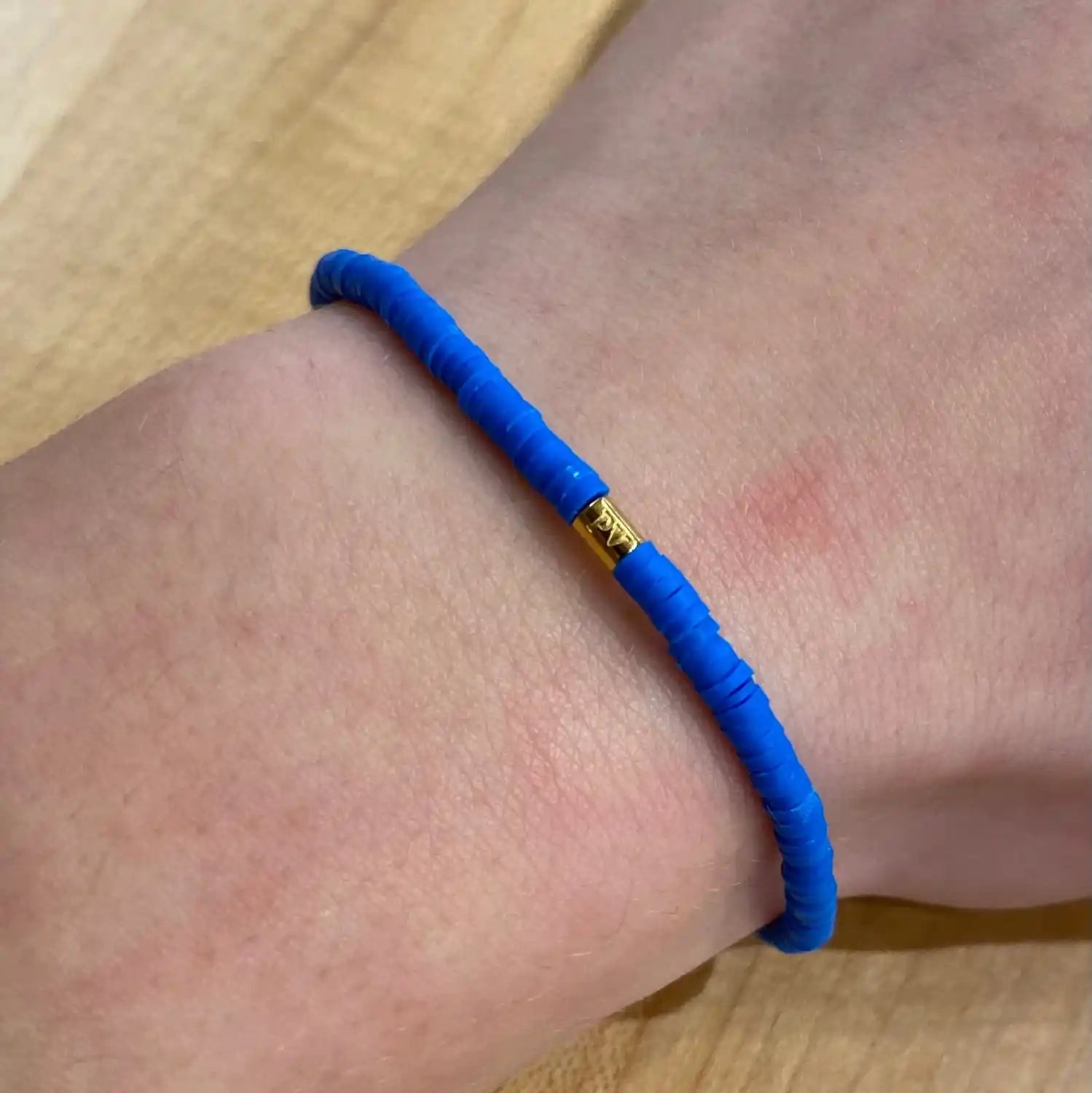 Pura Vida Solid Cabrillo Stretch Bracelet in blue, view on model 