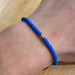 Pura Vida Solid Cabrillo Stretch Bracelet in blue, view on model 