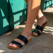 Reef Women's Cushion Vista Sandal in black & natural, model view
