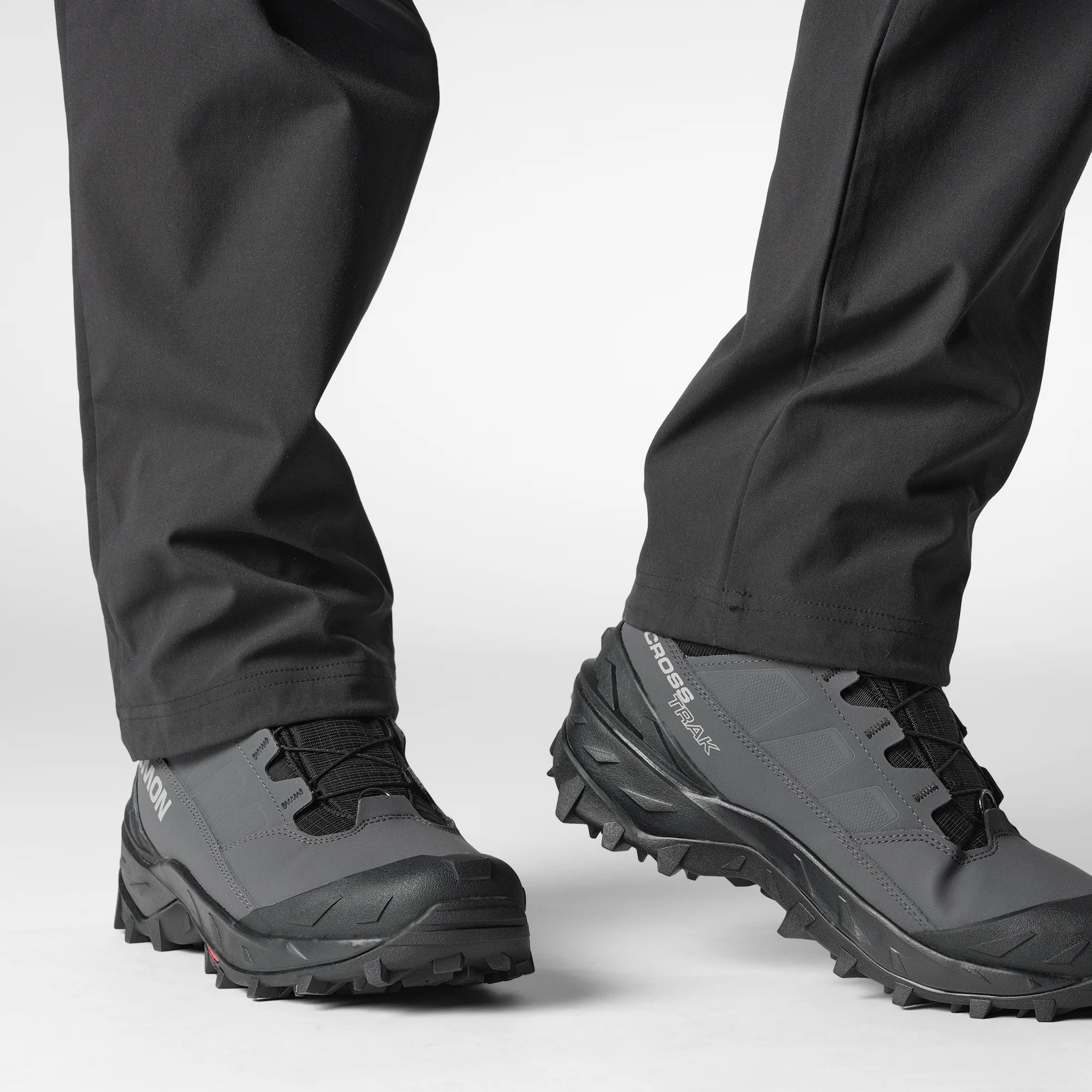 Salomon Men's CROSSTRAK POWDER WATERPROOF Hiking Boot in asphalt & black, side view on model