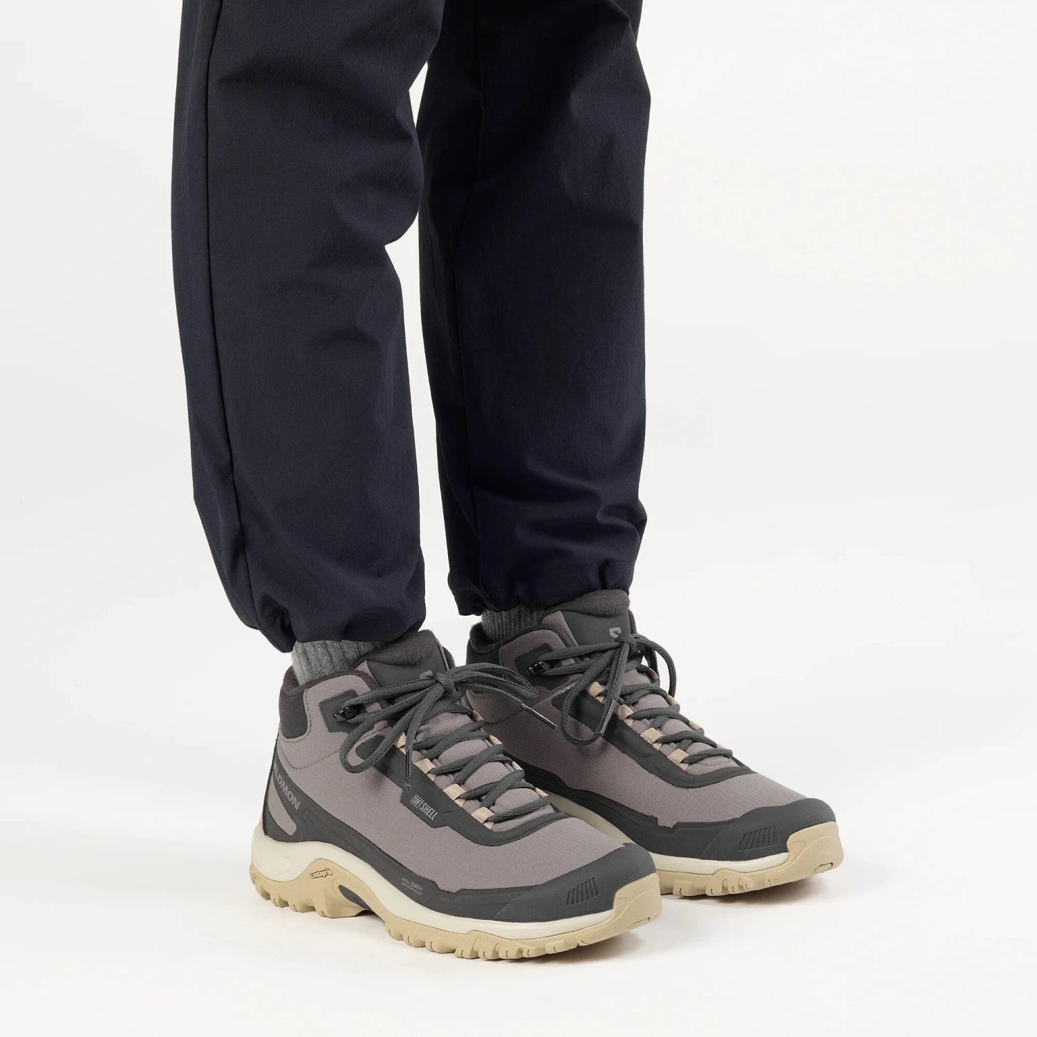 Salomon Women's SHELTER WATERPROOF Hiking Boot in plum kitten & phantom, side view on model