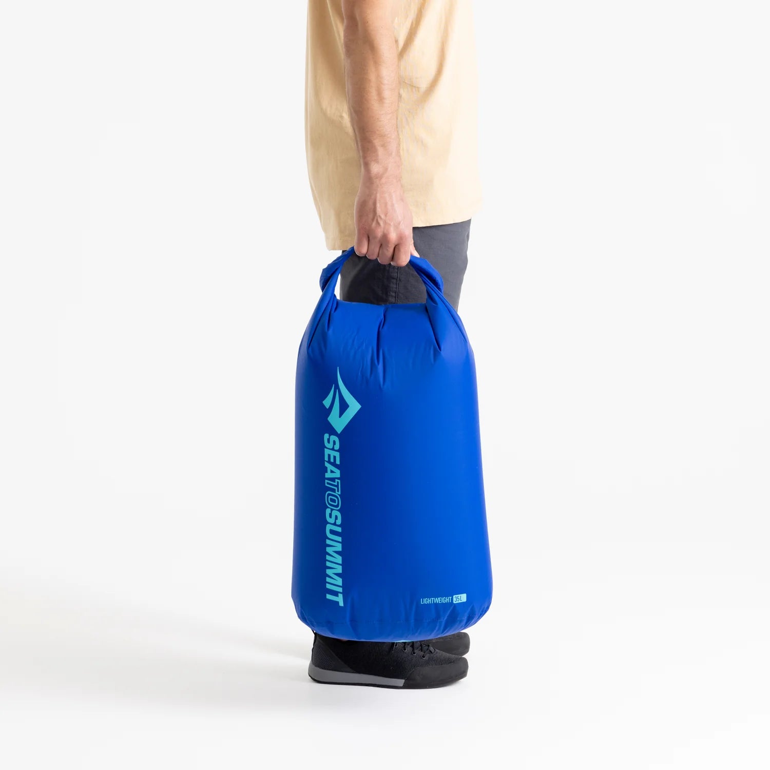 Sea To Summit Lightweight Dry Bag, model holding 35L