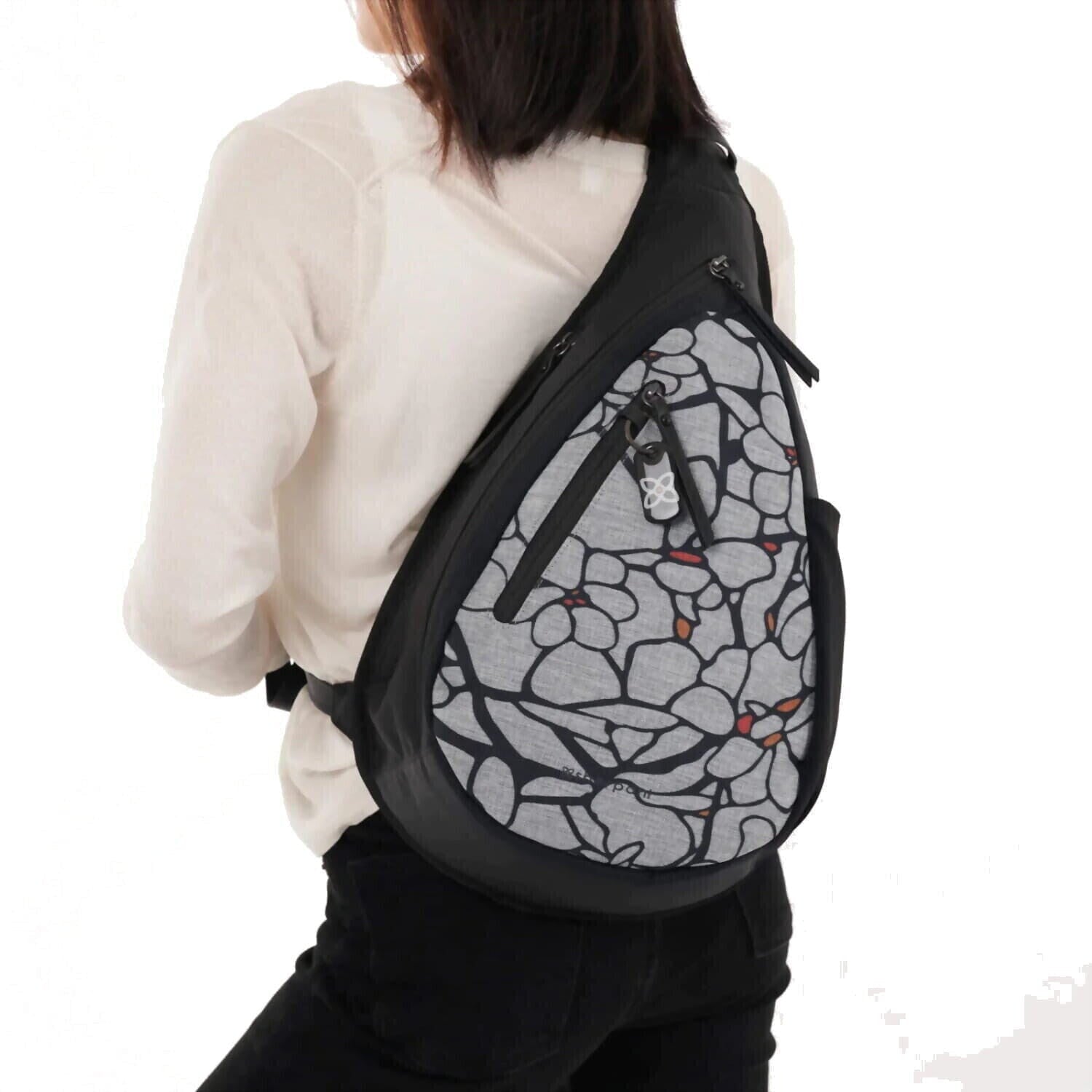 Sherpani Esprit AT | Travel Sling Bag, Sakura, front view on model