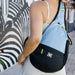 Sherpani Esprit Sling Bag, Maui Blue, front view on model 