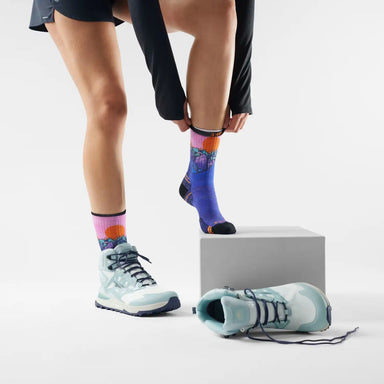 Smartwool Women's Hike Targeted Cushion Mountain Sunrise Print Crew Socks in Deep Navy, model