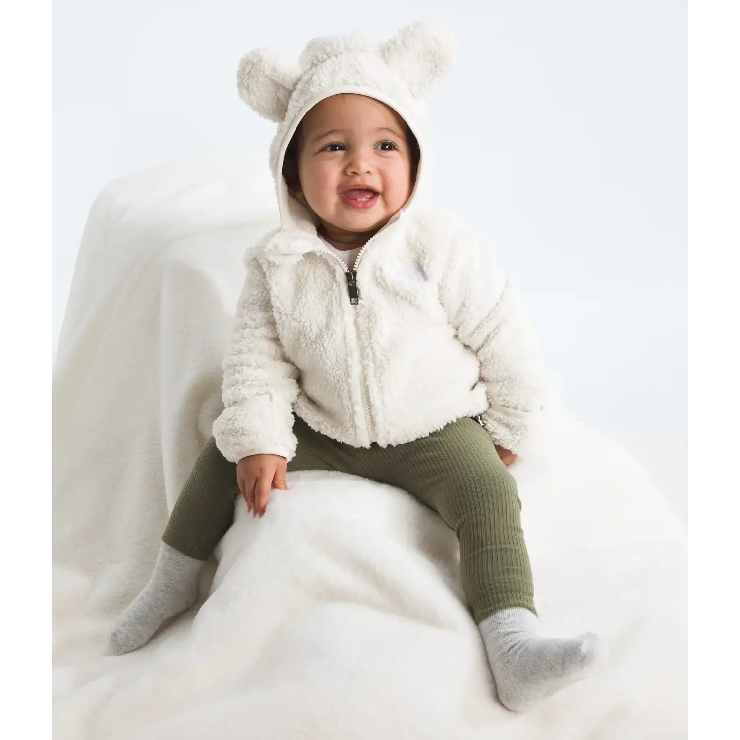 The North Face Baby Campshire Full-Zip Hoodie in Dune White, front view on  model