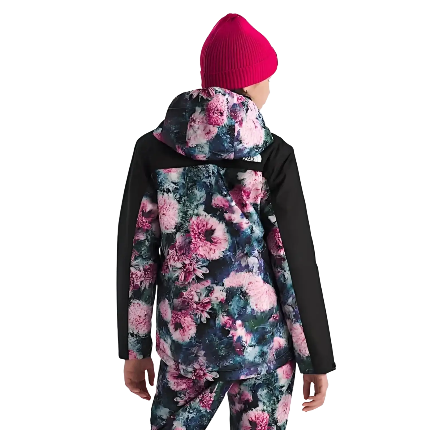 The North Face Girl's Freedom Insulated Jacket in pale blosson frozen flower print, on model back view