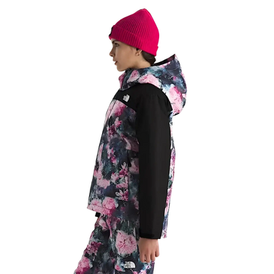 The North Face Girl's Freedom Insulated Jacket in pale blosson frozen flower print, on model side view
