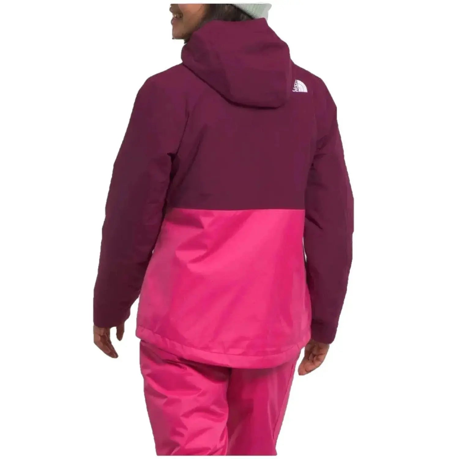 The North Face Girl’s Freedom Triclimate® shown in the Boysenberry color option. Back view on model.