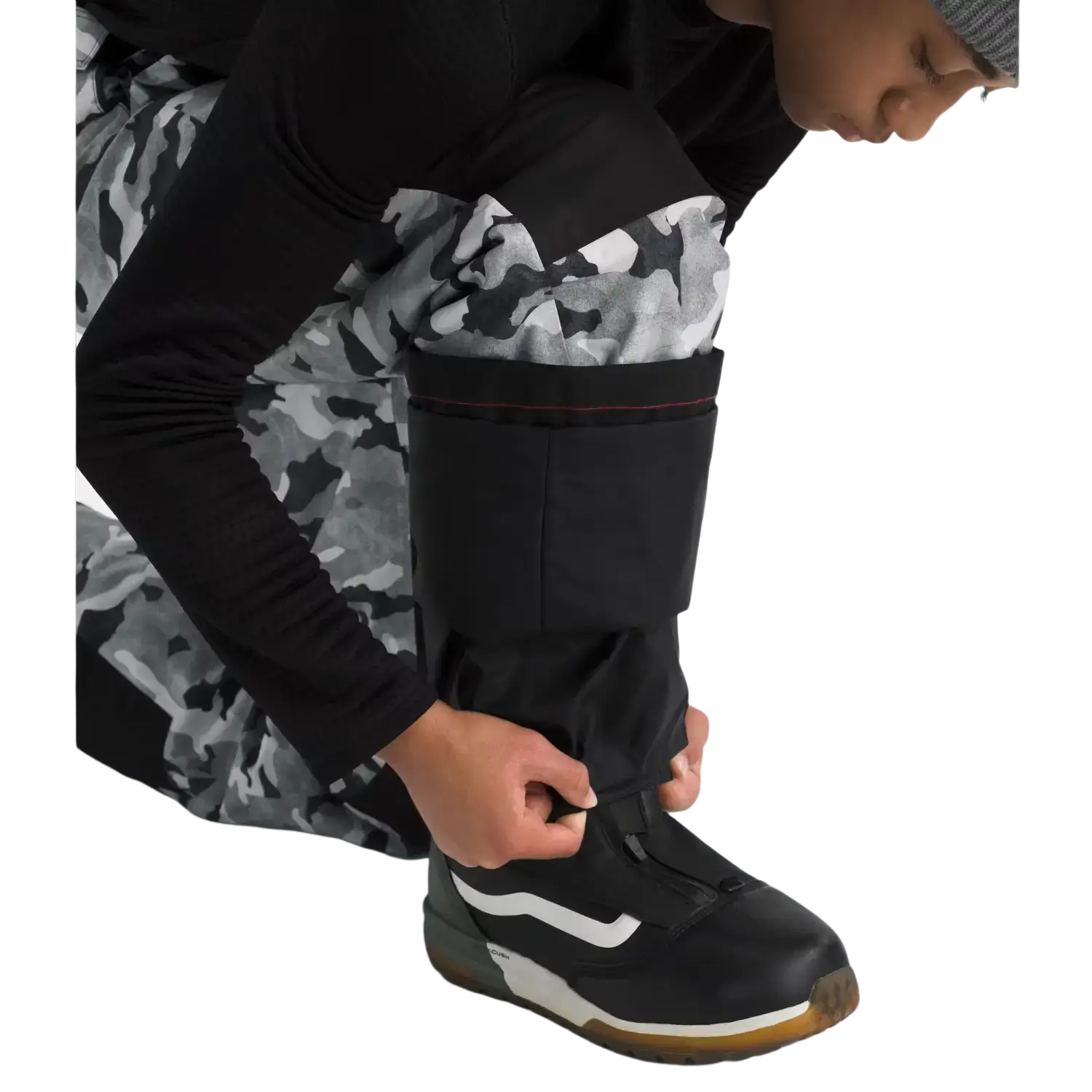 The North Face K's Freedom Insulated Pants in Smoked Pearl TNF Camo, view of cuff on model 