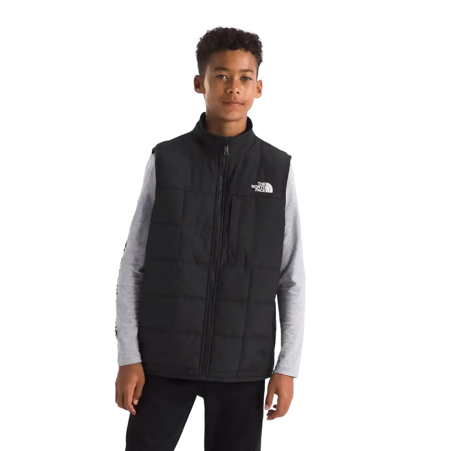 The North Face Kid's Reversible Shasta Vest in TNF Black, front view on model 