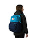 The North Face Kid's Chuckwalla Backpack in dusk blue & summit navy, on model back view