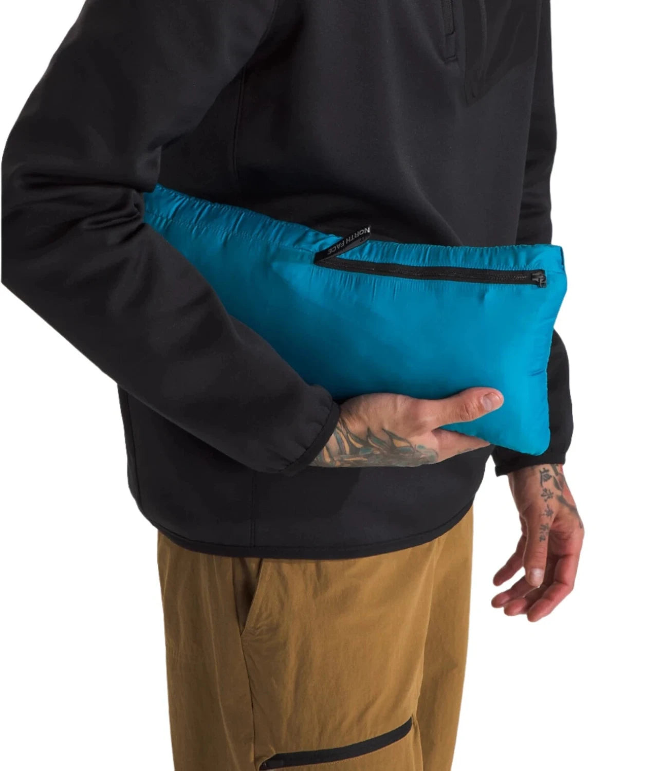 The North Face M’s Terra Peak Hoodie, Midnight Petrol, view of model holding jacket packed up 