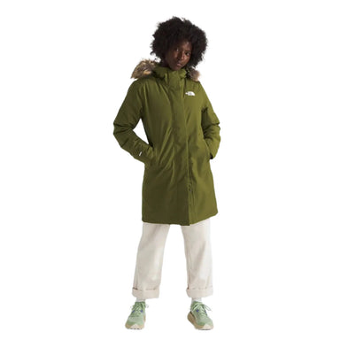 the north face women's arctic parka in forest olive front full model view