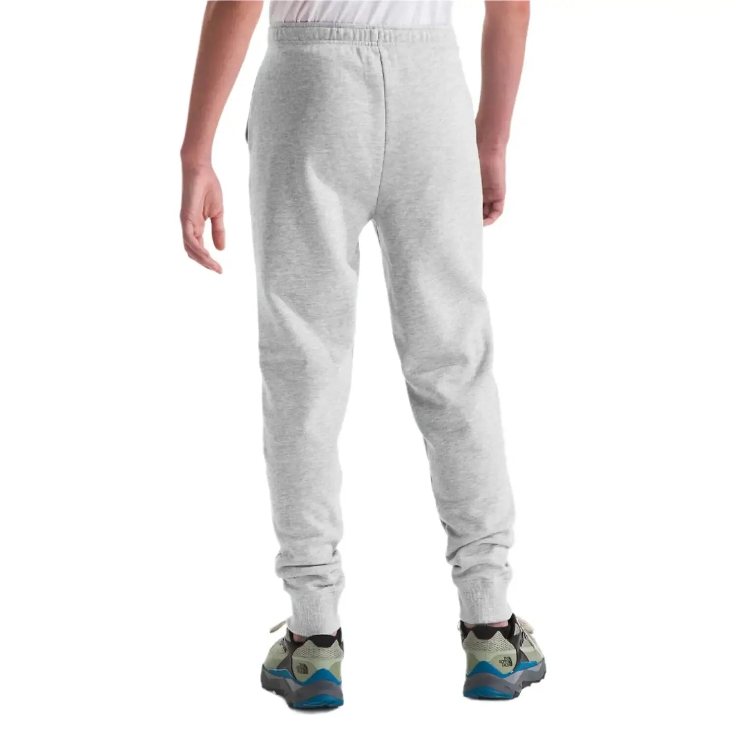 The North Face K's Camp Fleece Joggers, TNF Light Grey Heather, back view on model 