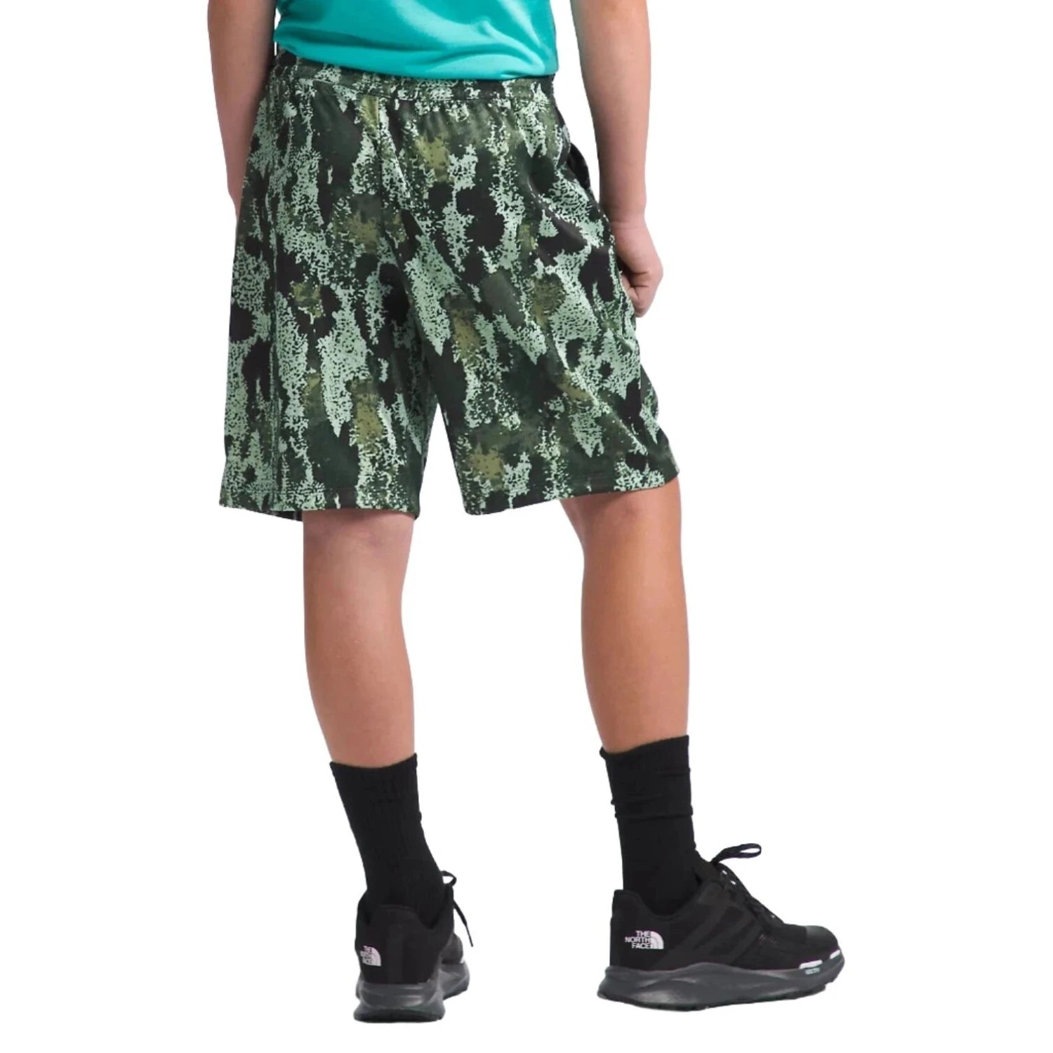 The North Face K's Never Stop Shorts, Misty Sage Camo Print, back view on model