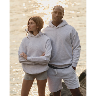 Vuori Restore Oversized Hoodie in Pale Grey Heather, front view on male and female model 