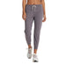 Vuori Women's Performance Jogger shown on model in Sawyer Heather, a light purple heather color. Front View.