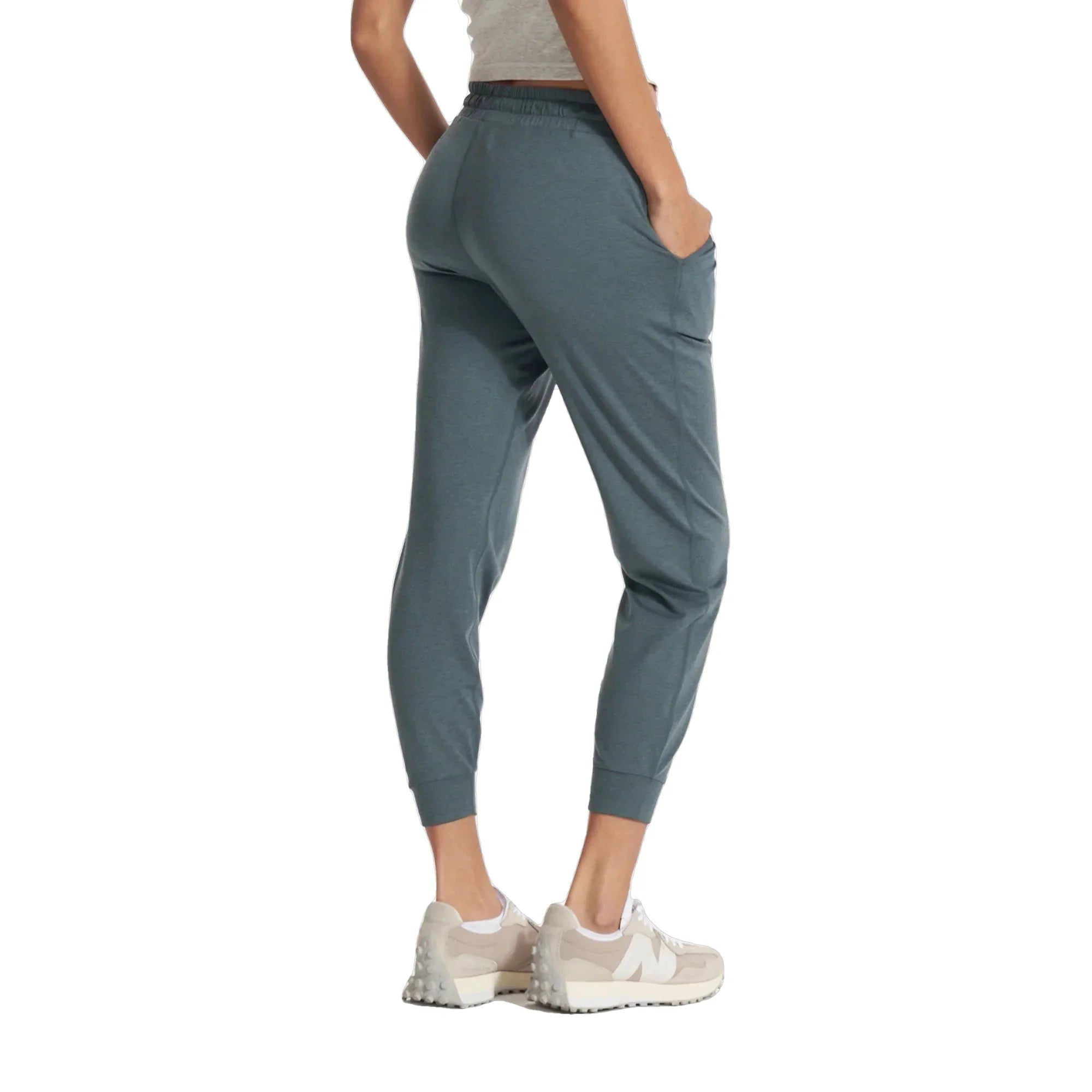 Vuori Women's Performance Jogger shown on model in Lake Heather, a blue-green color.  Back View.