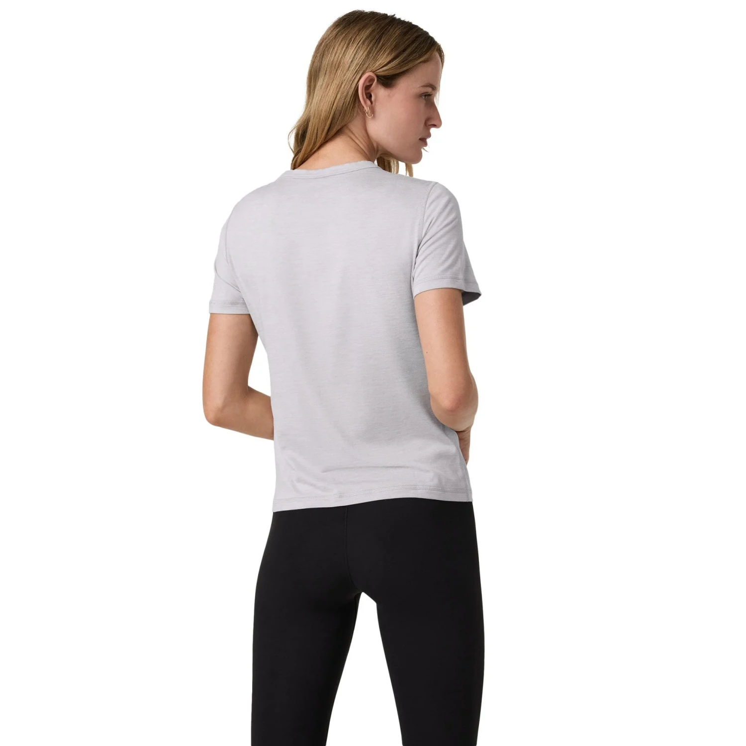 Vuori Women's Lux Tee in light grey heather, on model back