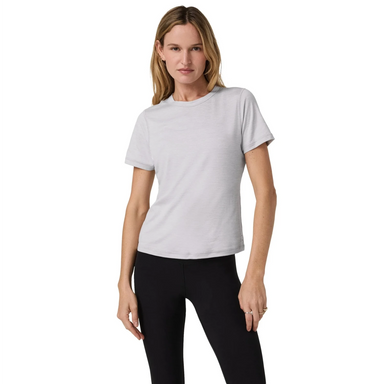 Vuori Women's Lux Tee in light grey heather, on model front
