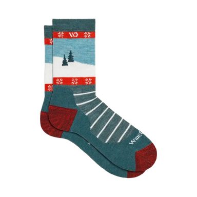 Teal sock with winter scene design on a white background
