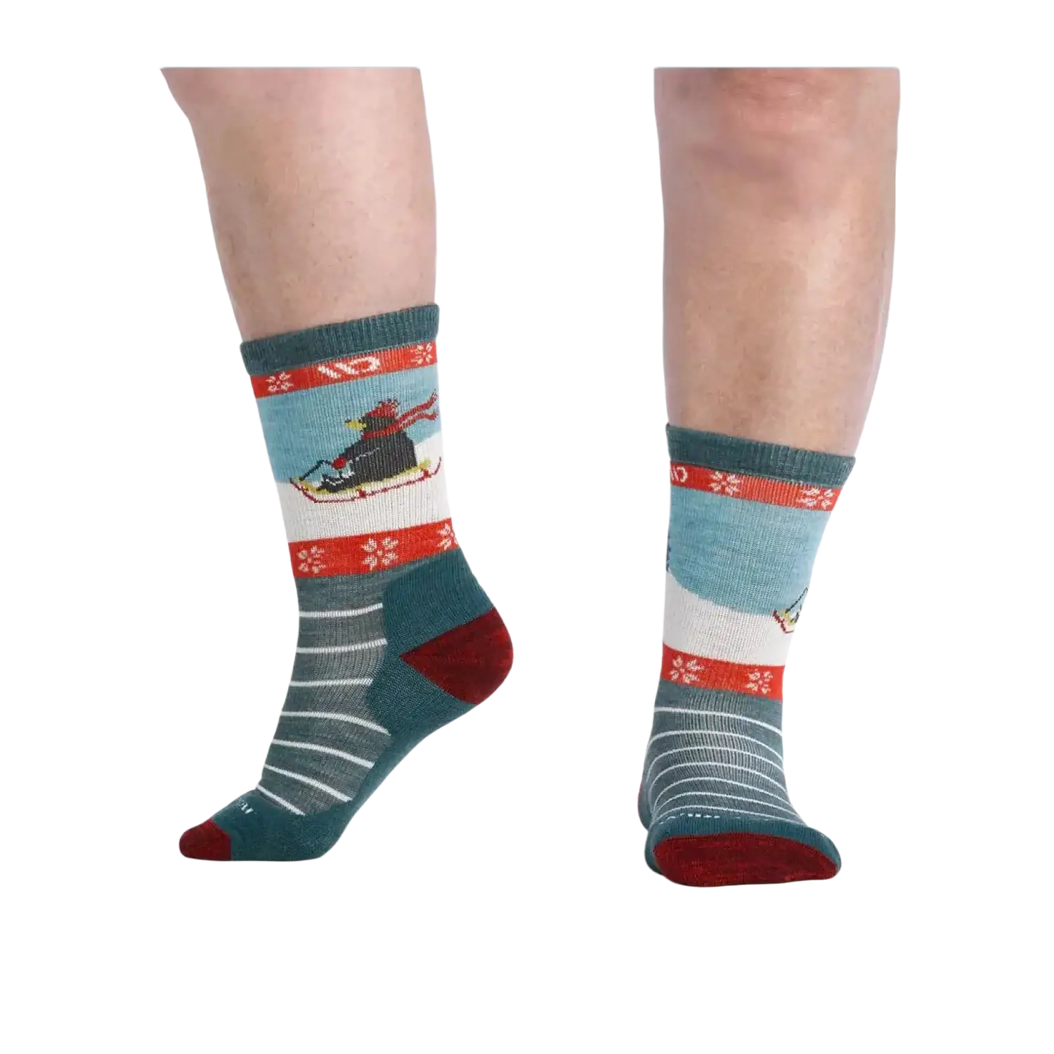 Colorful socks with festive designs  of bear on a sleigh