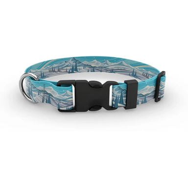 Wingo Outdoors Dog Collar in Alpine Snow design, snowy mountain and tree scape of aqua, blue, white, and greys. With black buckle and silver D ring.