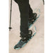Tubbs Women's Panoramic 25" Snowshoe in Ice Blue and Grey, lifestyle image of women walking in deep snow.