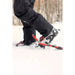 Tubbs Men's Panoramic 30 Snowshoe in Black and Red, lifestyle view of man in deep snow.